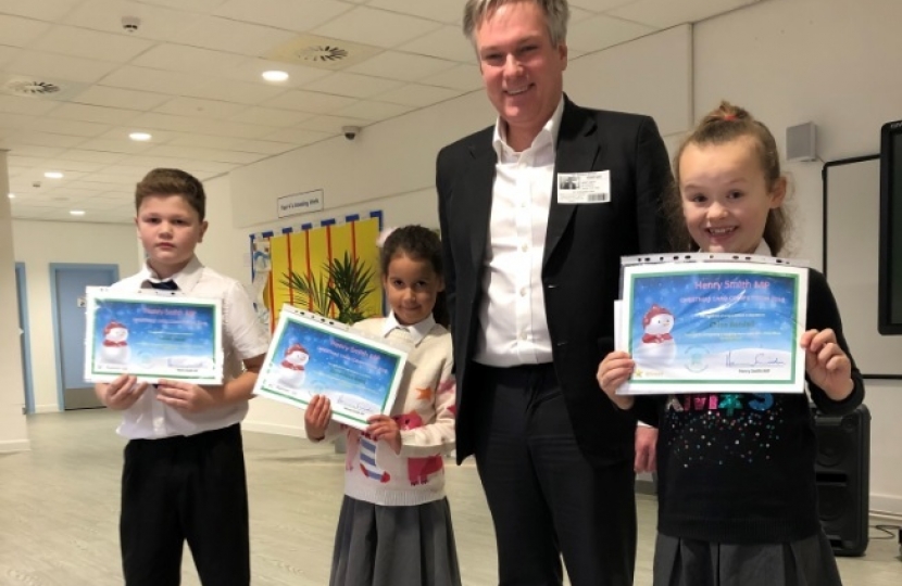 Crawley MP congratulates 2018 Christmas Card Competition champion