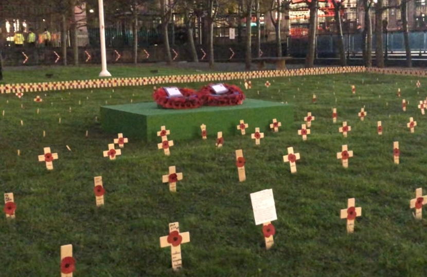 Henry Smith MP plants wooden cross in Parliamentary Garden of Remembrance