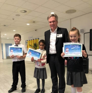 Crawley MP congratulates 2018 Christmas Card Competition champion