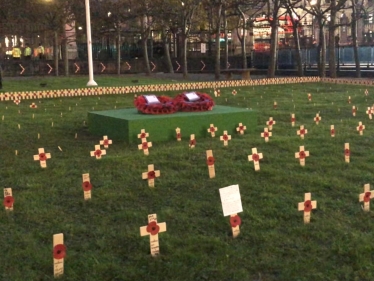 Henry Smith MP plants wooden cross in Parliamentary Garden of Remembrance