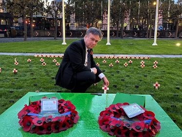 Henry Smith MP plants wooden cross in Parliamentary Garden of Remembrance in honour of Crawley's fallen